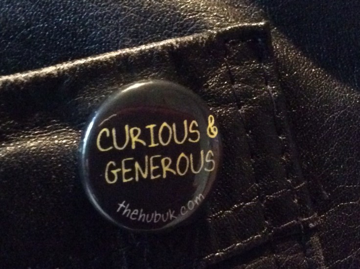 curious and generous badge